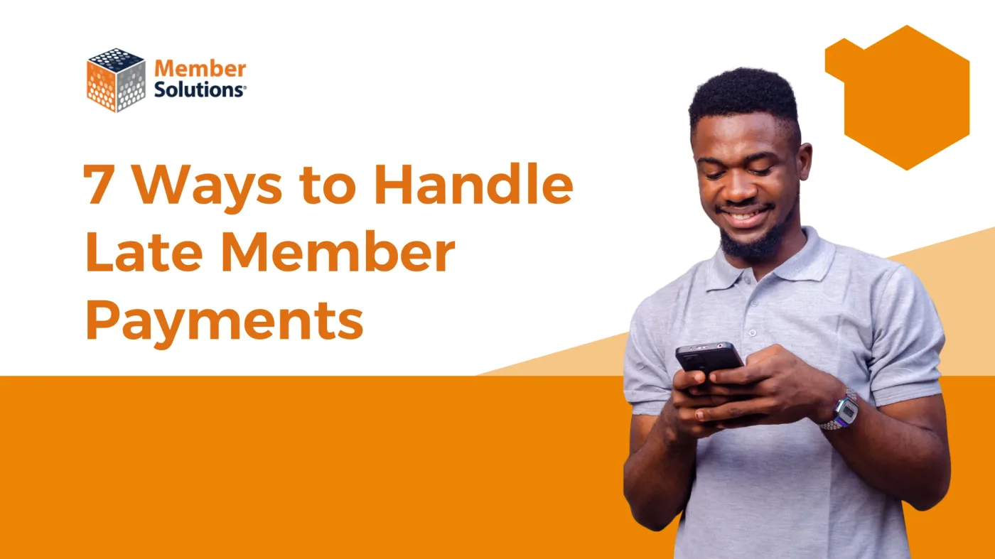 Gym administrator reviewing outstanding member payment accounts on a tablet
