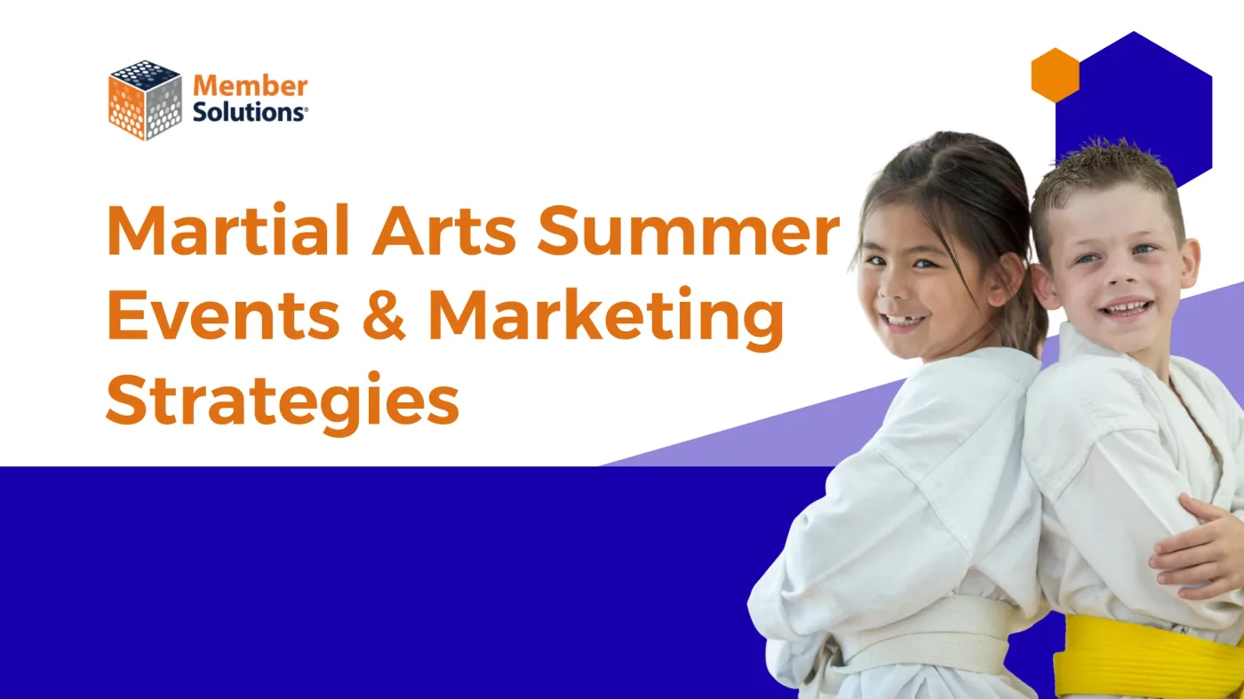 Martial arts students at an outdoor summer event demonstration