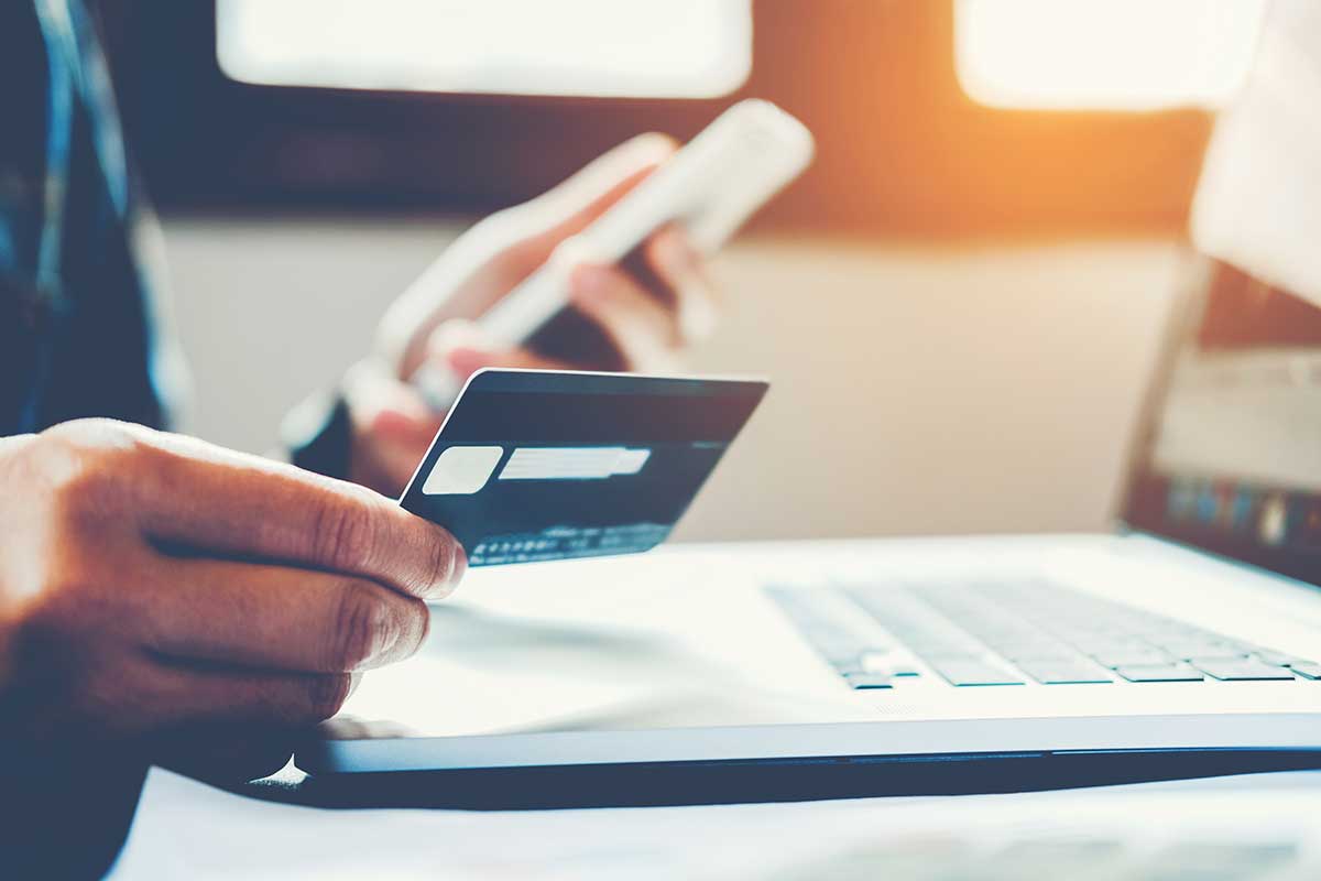 Credit Card and Mobile Phone in hand