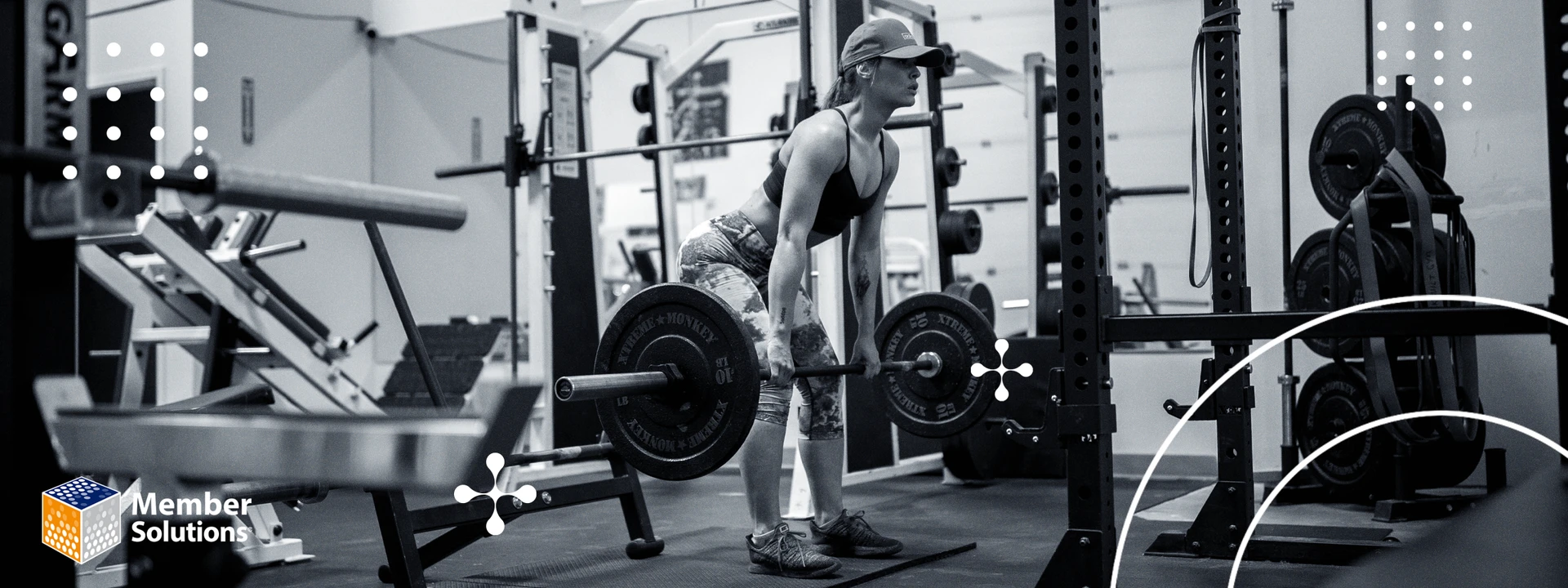 A lady at the gym picked up a barbell for her workout